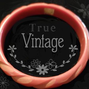 Beautiful carved bakelite bangle